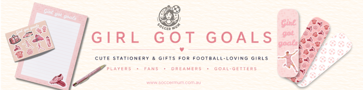 A promotional banner for 'Girl Got Goals' stationery and gifts, featuring pink and white designs. On the left, a pink notepad with a cute soccer-themed sticker sheet and a pink pen are displayed.