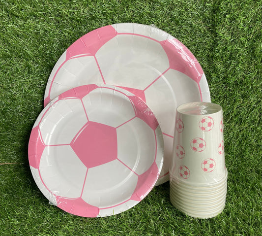 Pink Soccer Ball Paper Plates and paper cups displayed as a bundle on astro turf grass.
