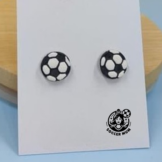 Black and white Soccer Ball stud earrings on a earring board with Soccer Mum brand logo. 
