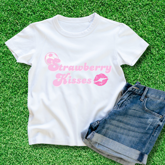 Strawberry Kisses text in pink with pink soccer ball image and pink set of lips